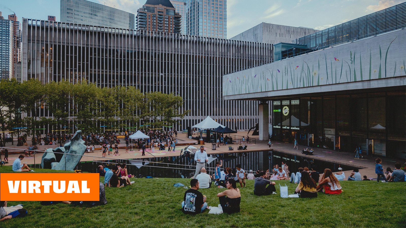 Lincoln Center’s Hearst Plaza full of people on a sunny day, decorated for Summer for the City